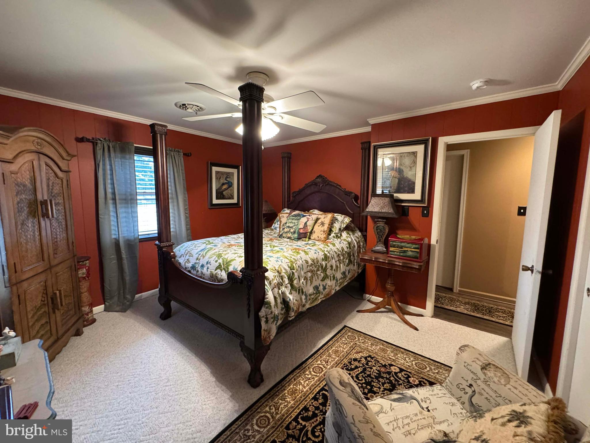 5000 Joshua Thomas Road Marion Station, MD 21838 - Photo 49 of 77 a bedroom with a bed and wooden floor