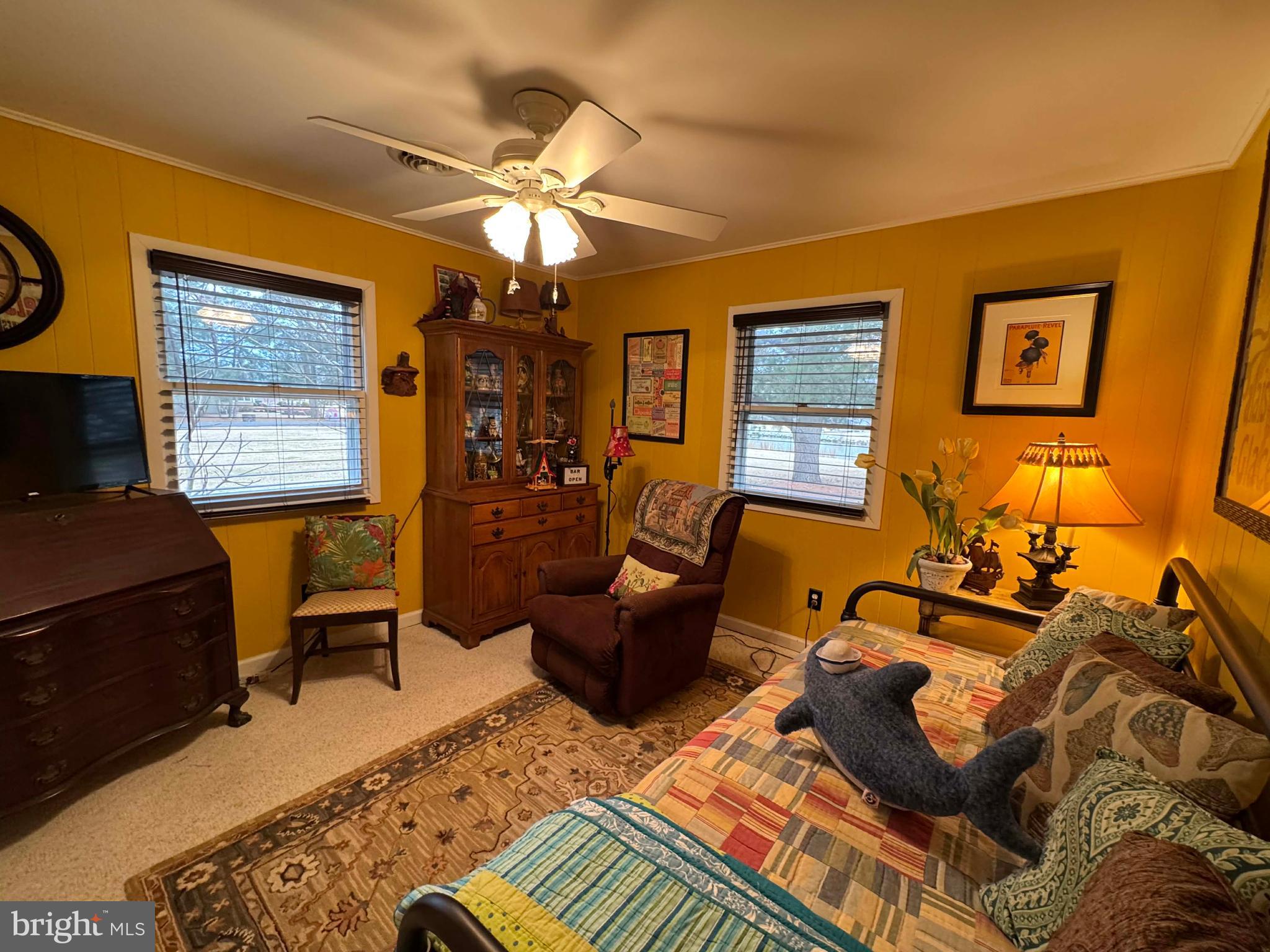 5000 Joshua Thomas Road Marion Station, MD 21838 - Photo 52 of 77 a living room with furniture and a flat screen tv