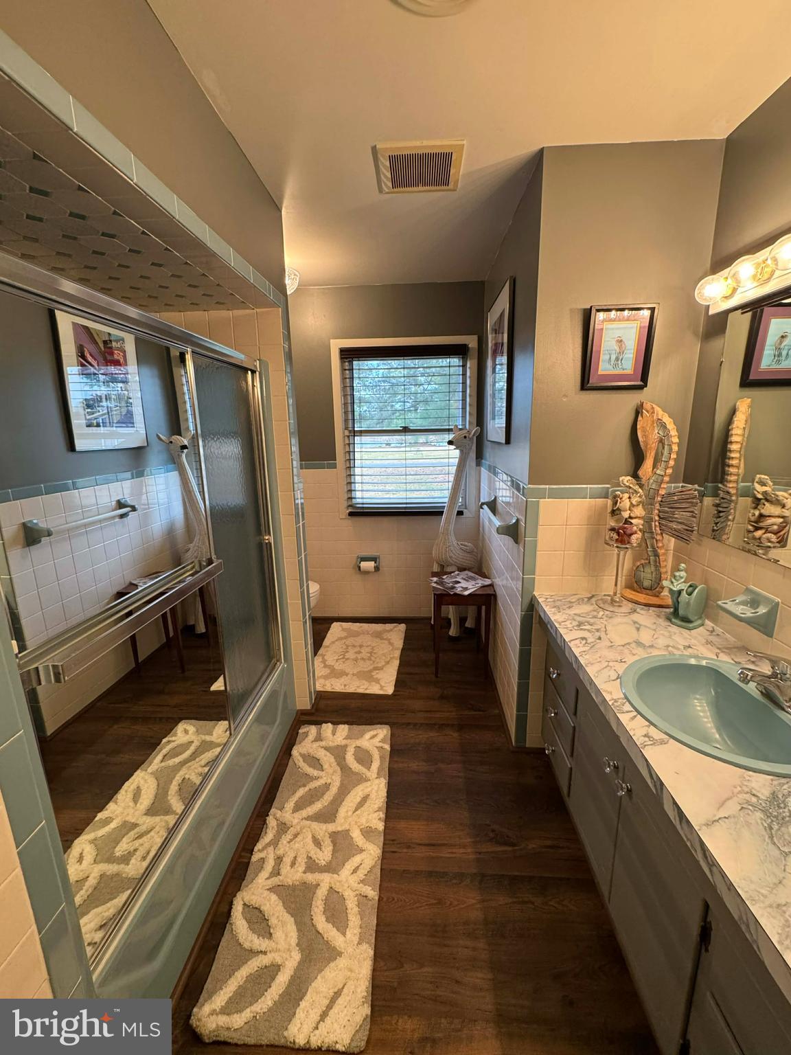 5000 Joshua Thomas Road Marion Station, MD 21838 - Photo 53 of 77 a large bathroom with double vanity sink and a mirror