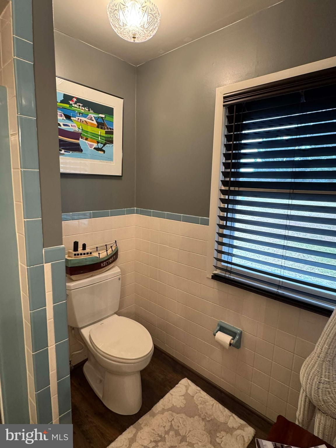 5000 Joshua Thomas Road Marion Station, MD 21838 - Photo 55 of 77 a white toilet sitting next to a bathroom sink