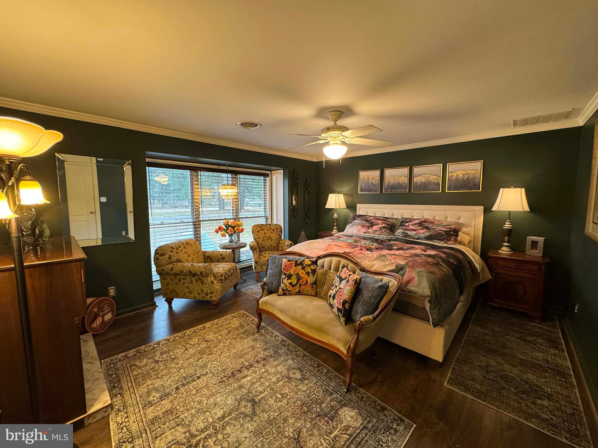 5000 Joshua Thomas Road Marion Station, MD 21838 - Photo 72 of 77 a bedroom with a bed and lamp with window