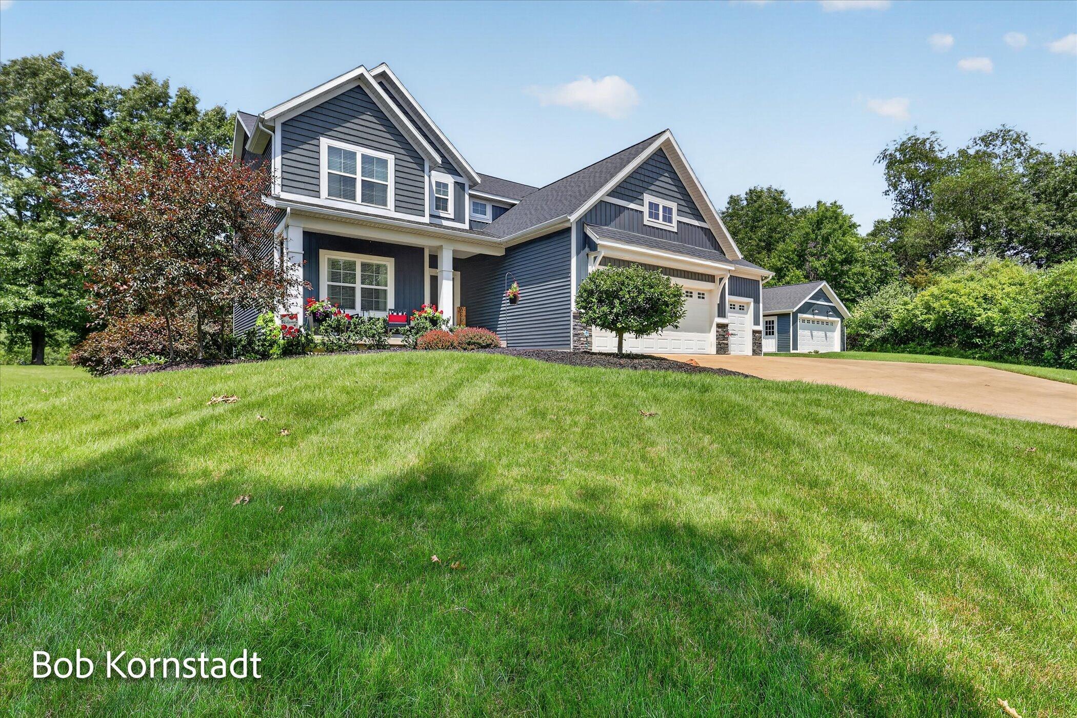 8059 Buttrick Ridge Trail Alto, MI 49302 - Photo 1 of 72 front