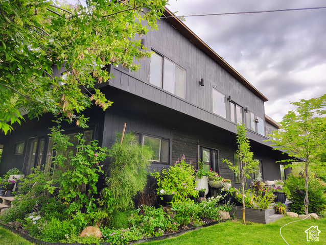 1397 Ritter Drive Riverdale, UT 84405 - Photo 1 of 21 Modern exterior with dark vertical siding