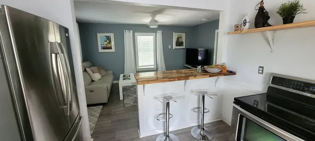 a living room with furniture and a window