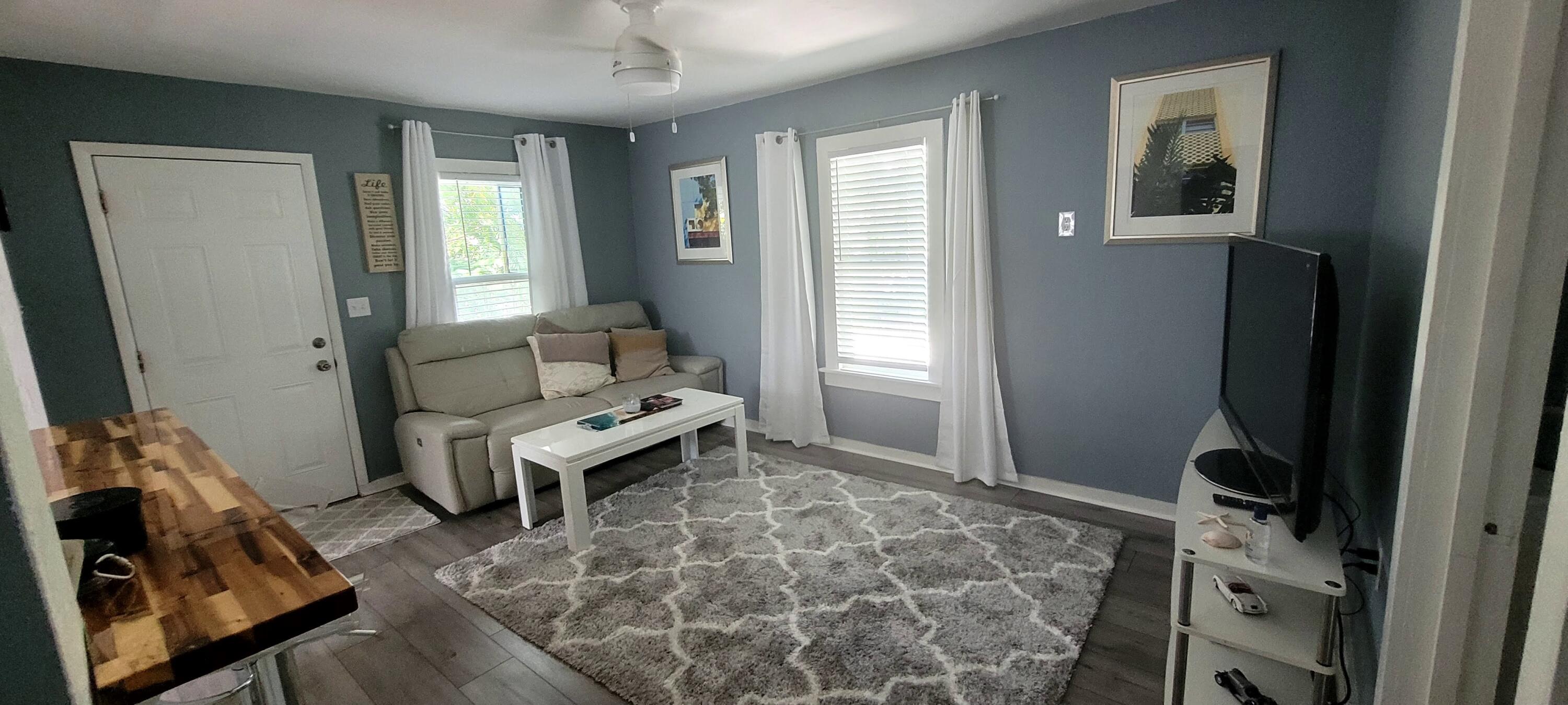 104 Northeast 5th Street Fort Lauderdale, FL 33301 - Photo 21 of 26 a living room with furniture and a window