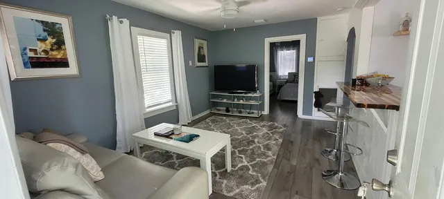 a bathroom with a toilet a sink and a bathtub
