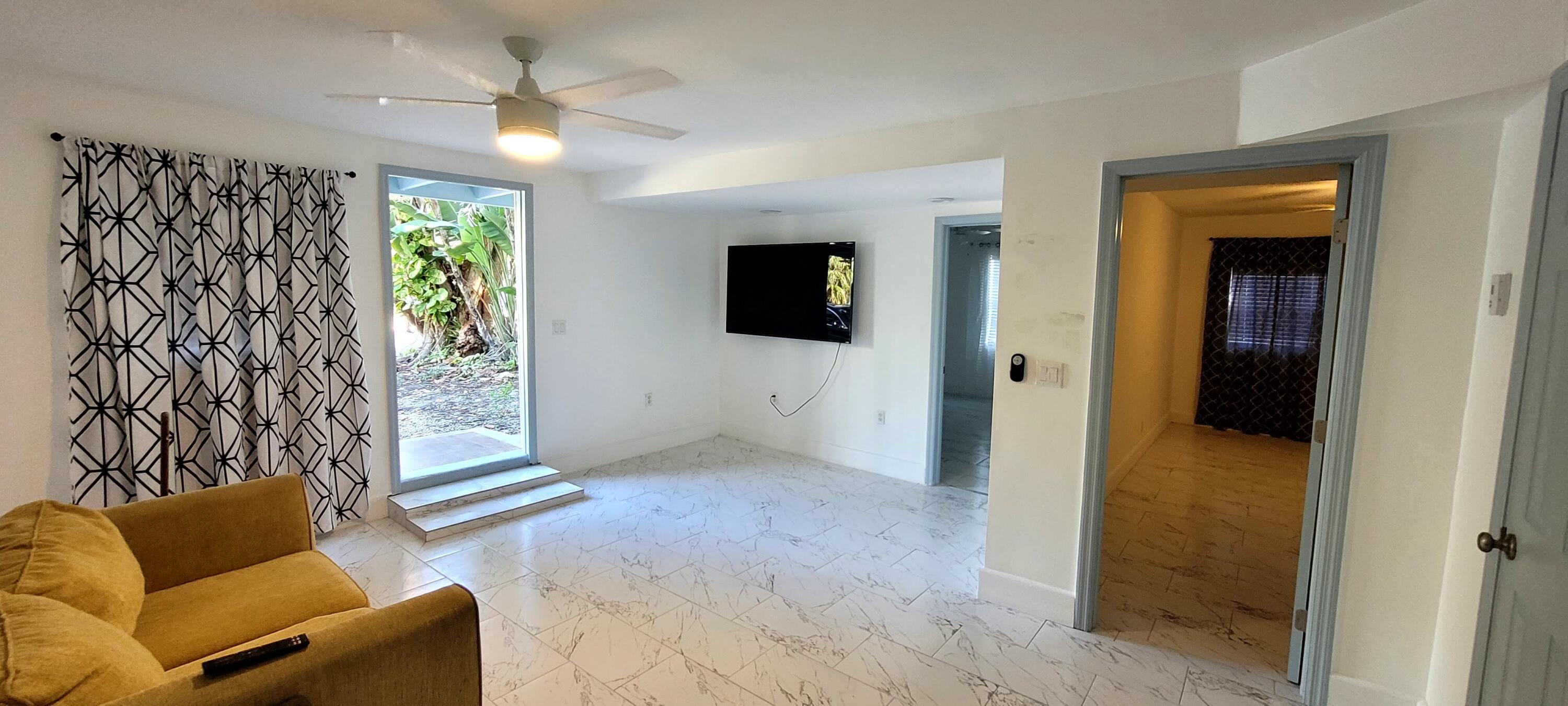104 Northeast 5th Street Fort Lauderdale, FL 33301 - Photo 7 of 26 a view of livingroom with furniture and windows