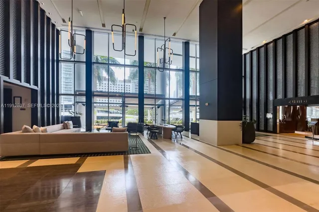 a room with a table and chairs