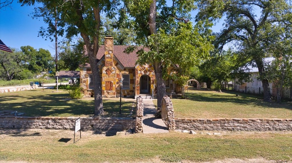 310 Canal Street Menard, TX 76859 - Photo 16 of 66 a view of a yard in front of a house