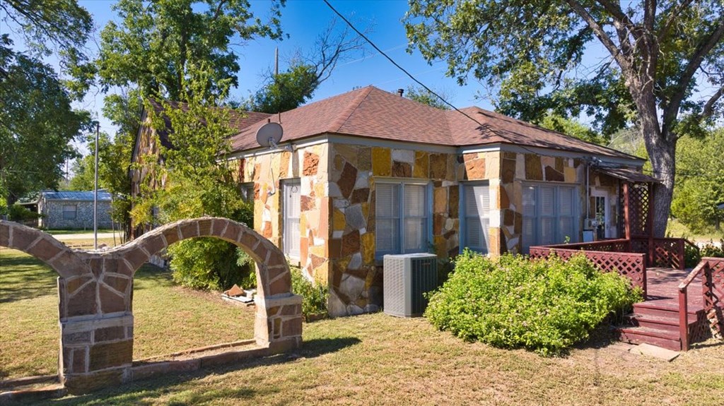 310 Canal Street Menard, TX 76859 - Photo 21 of 66 a front view of a house with garden