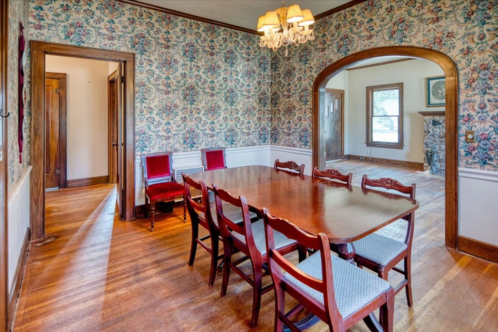 310 Canal Street Menard, TX 76859 - Photo 49 of 66 a view of a dining room with furniture and wooden floor