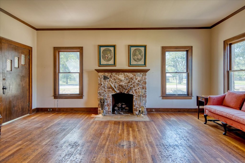 310 Canal Street Menard, TX 76859 - Photo 52 of 66 a living room with furniture and a fireplace