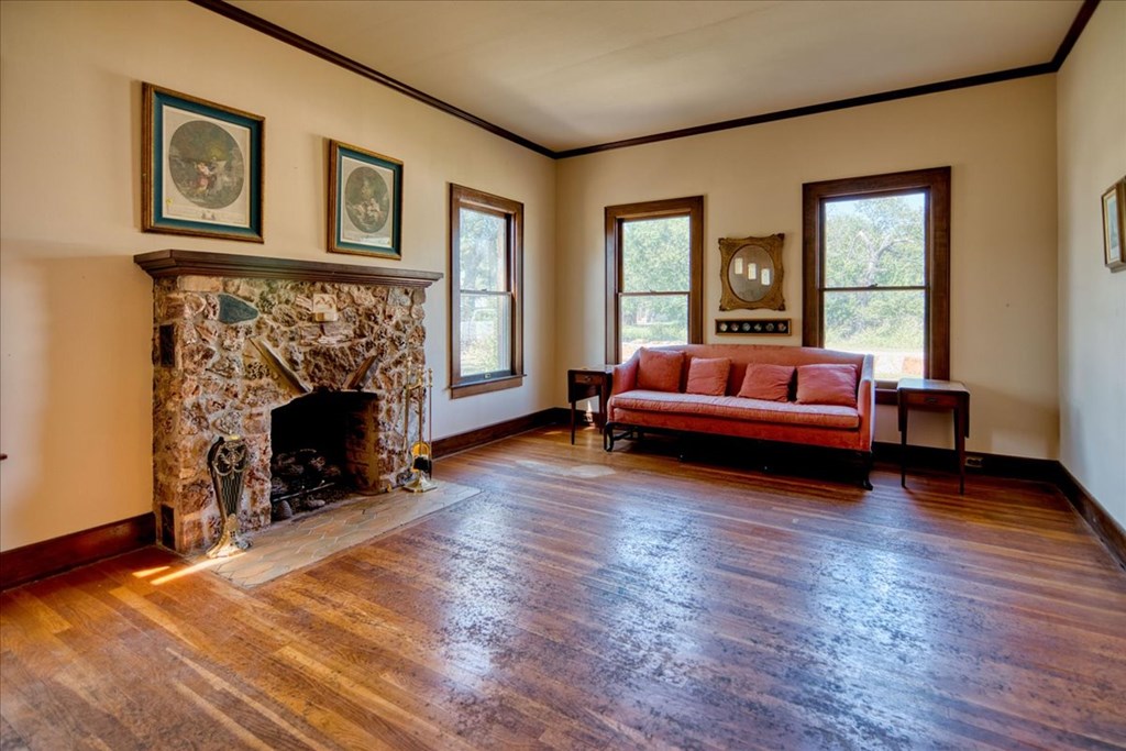 310 Canal Street Menard, TX 76859 - Photo 53 of 66 a living room with furniture and a fireplace