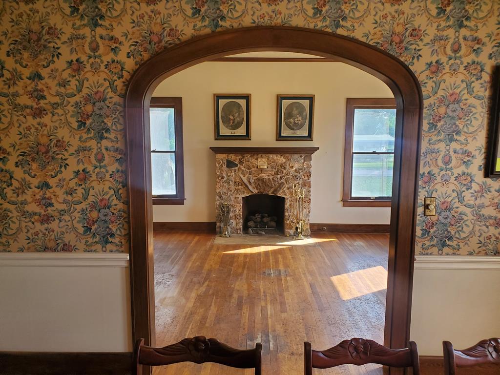 310 Canal Street Menard, TX 76859 - Photo 9 of 66 a view of a livingroom with a fireplace and a window