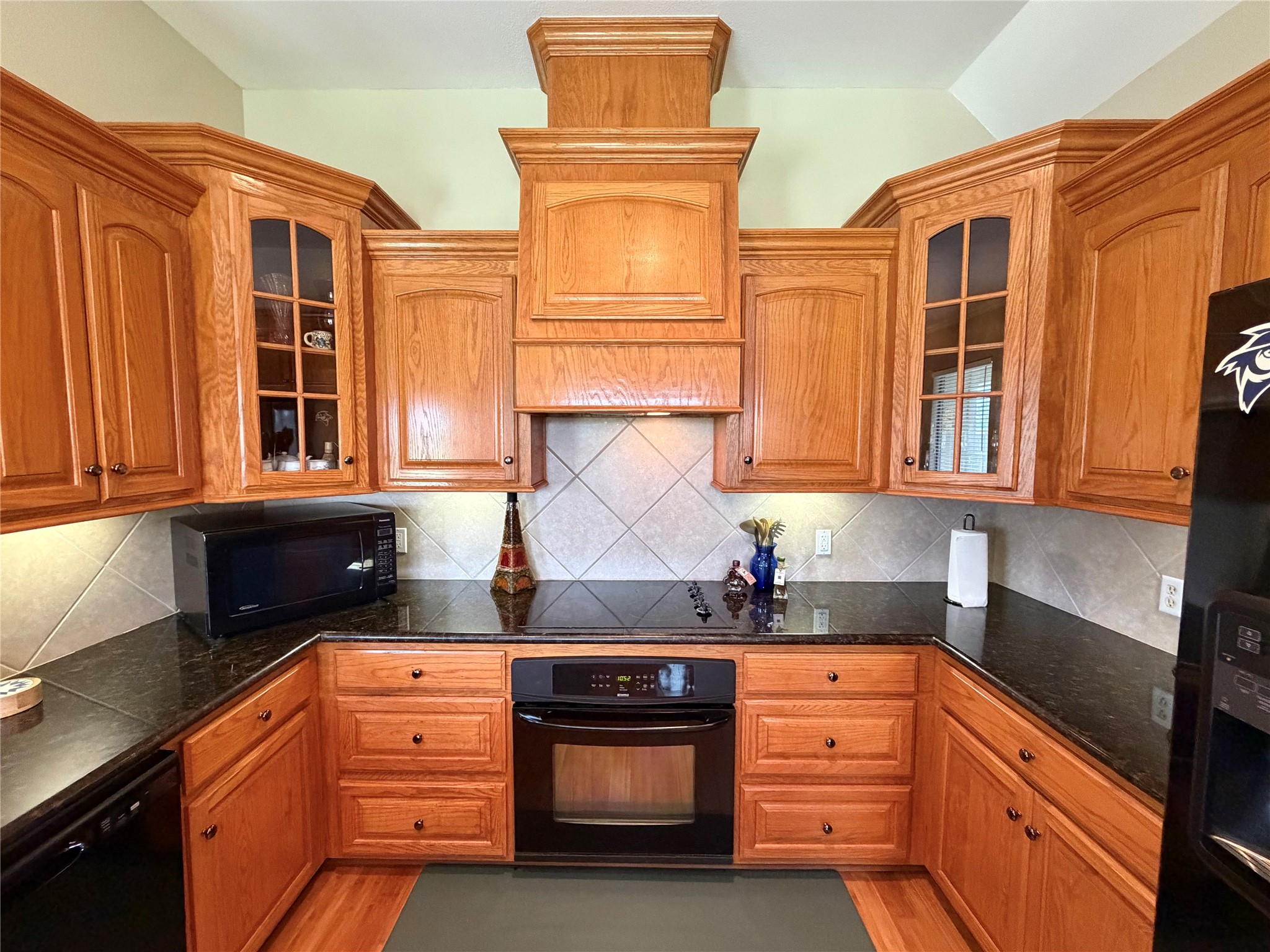 1448 South Blue Bonnet Lane Angleton, TX 77515 - Photo 11 of 43 a kitchen with stainless steel appliances granite countertop a stove and a sink