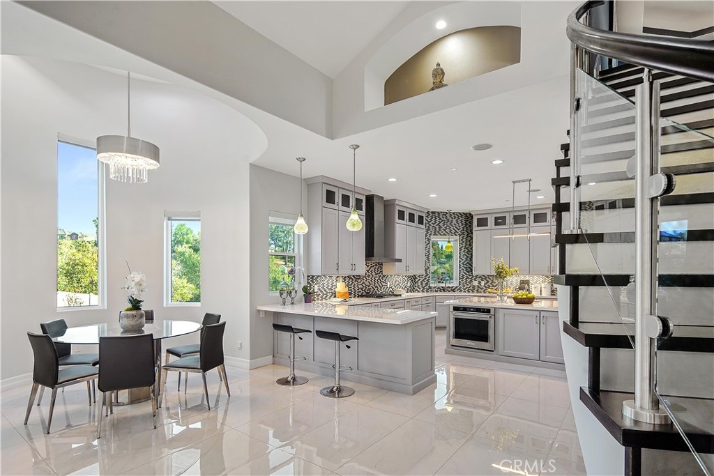 1693 Marion Road Redlands, CA 92374 - Photo 14 of 49 a large kitchen with a table and chairs