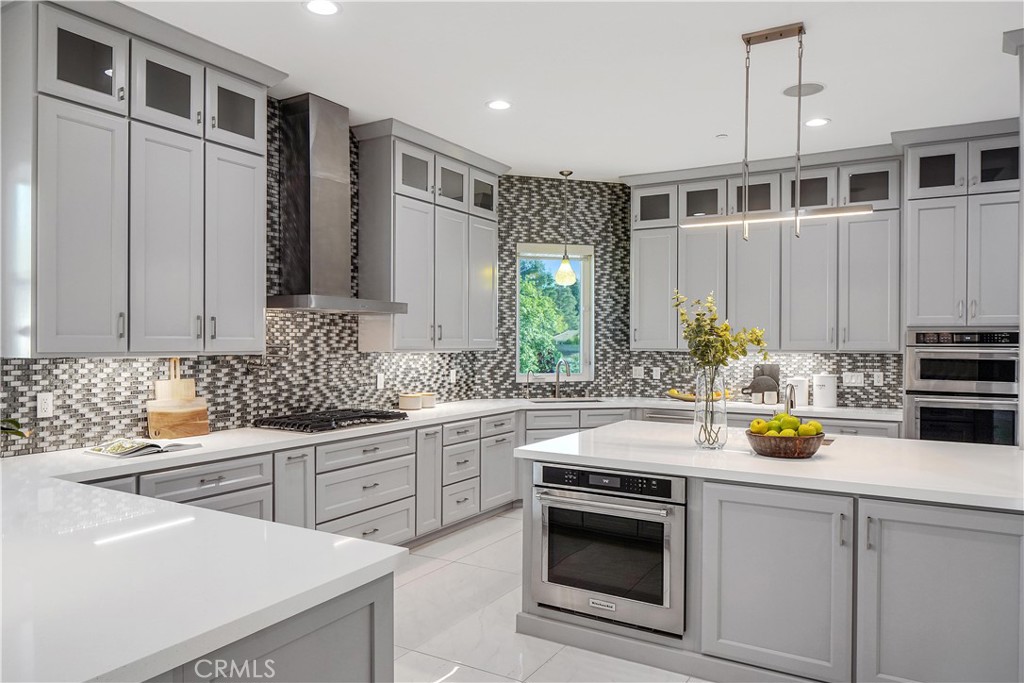 1693 Marion Road Redlands, CA 92374 - Photo 18 of 49 a kitchen with a sink stove and cabinets