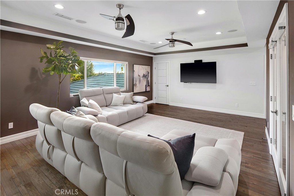 1693 Marion Road Redlands, CA 92374 - Photo 24 of 49 a living room with furniture and a flat screen tv