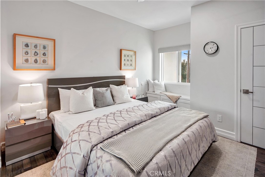 1693 Marion Road Redlands, CA 92374 - Photo 28 of 49 a bedroom with bed and painting on the wall