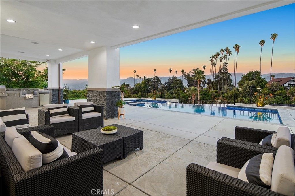 1693 Marion Road Redlands, CA 92374 - Photo 43 of 49 a living room with furniture and a potted plant