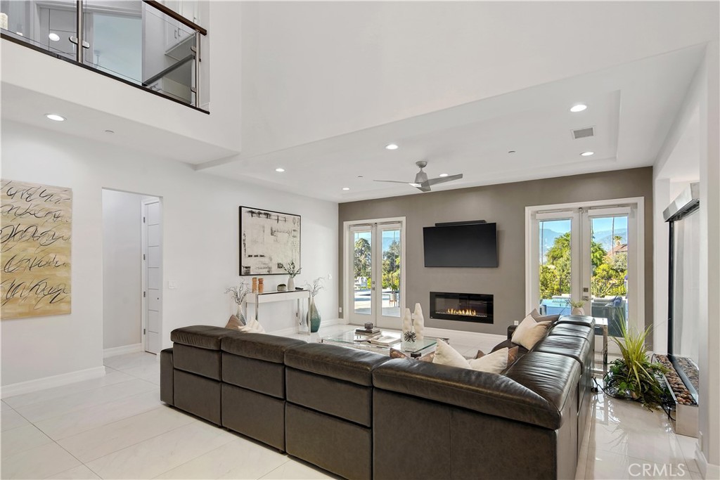 1693 Marion Road Redlands, CA 92374 - Photo 7 of 49 a living room with furniture fireplace and flat screen tv