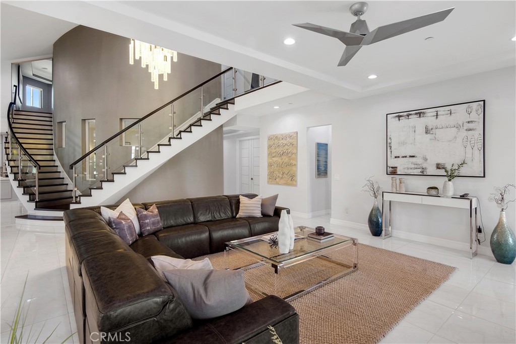 1693 Marion Road Redlands, CA 92374 - Photo 10 of 49 a living room with furniture and a chandelier