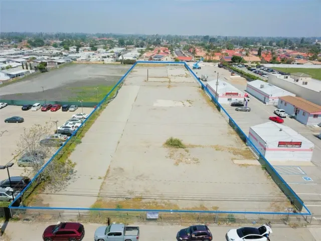 a view of swimming pool with a chairs