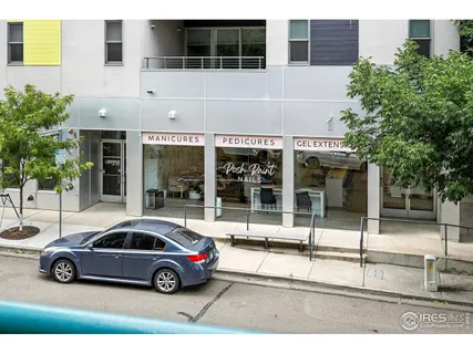 a car parked in front of a building