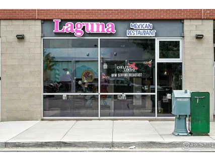 a view of a store with the street