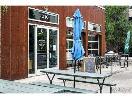 a building outdoor space with lots of furniture and garden