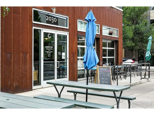 a building outdoor space with lots of furniture and garden