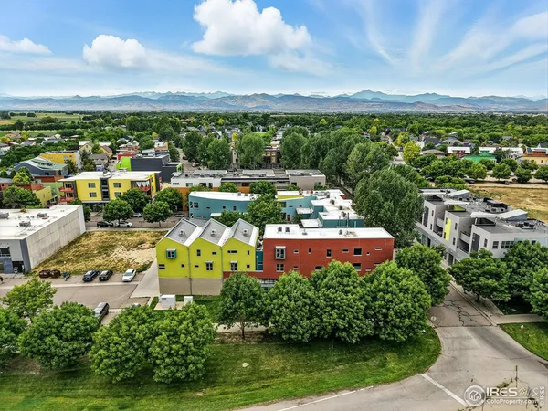 an aerial view of a house with a garden