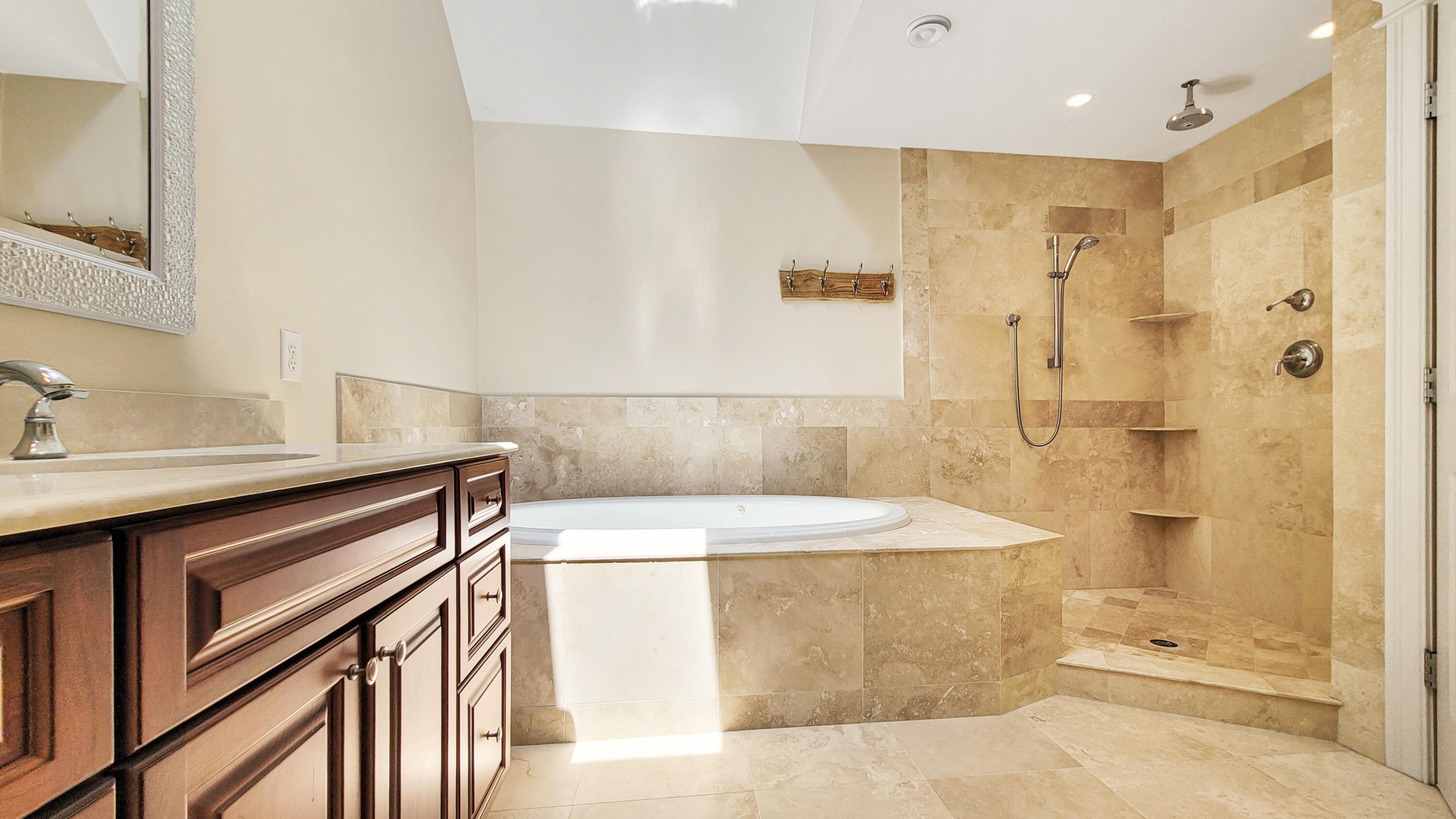 4 Quinns Way Mashpee, MA 02649 - Photo 19 of 28 a bathroom with a bathtub and a sink