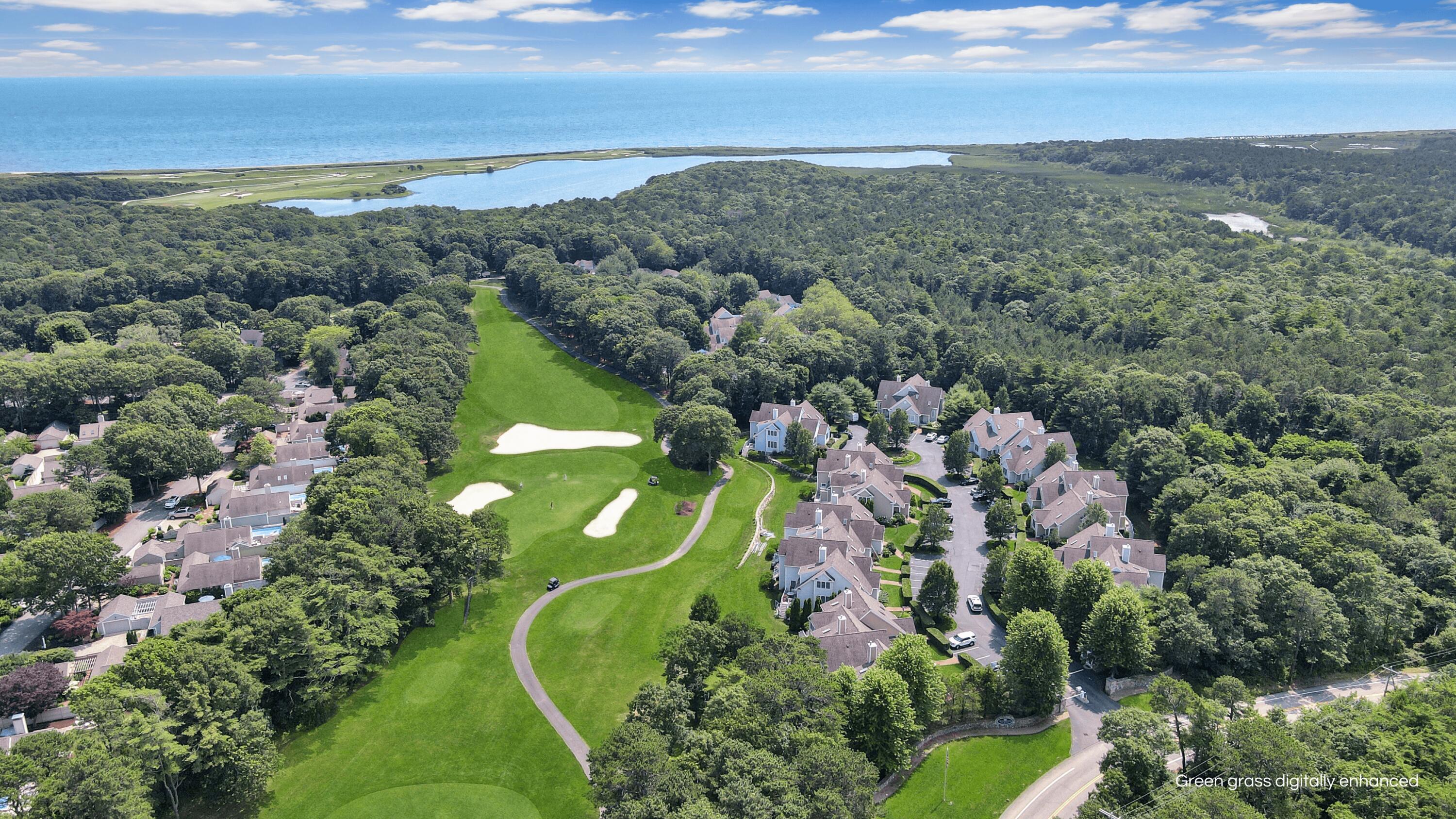 4 Quinns Way Mashpee, MA 02649 - Photo 27 of 28 an aerial view of a golf course with houses