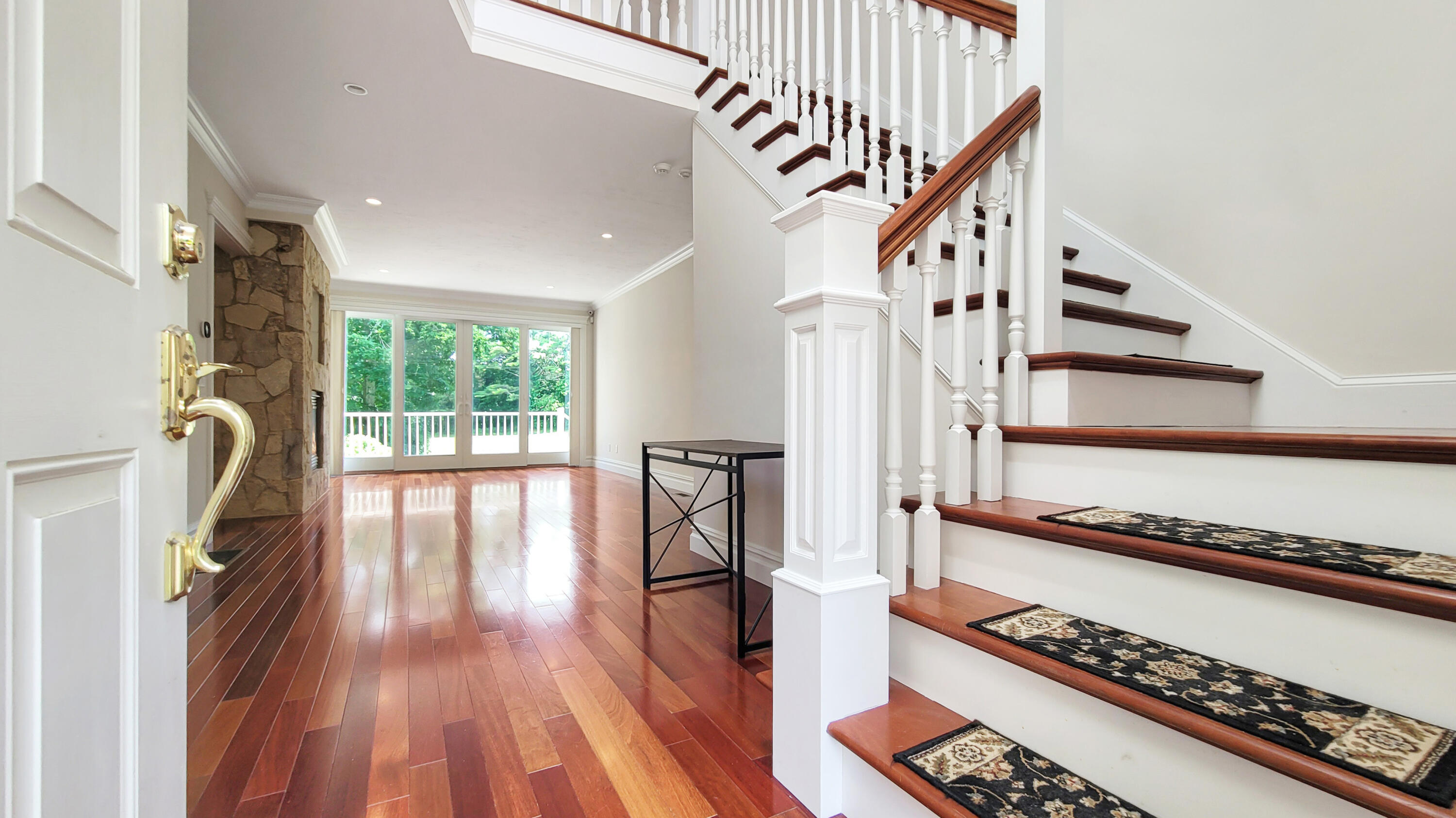 4 Quinns Way Mashpee, MA 02649 - Photo 3 of 28 a view of an entryway with wooden floor and staircase