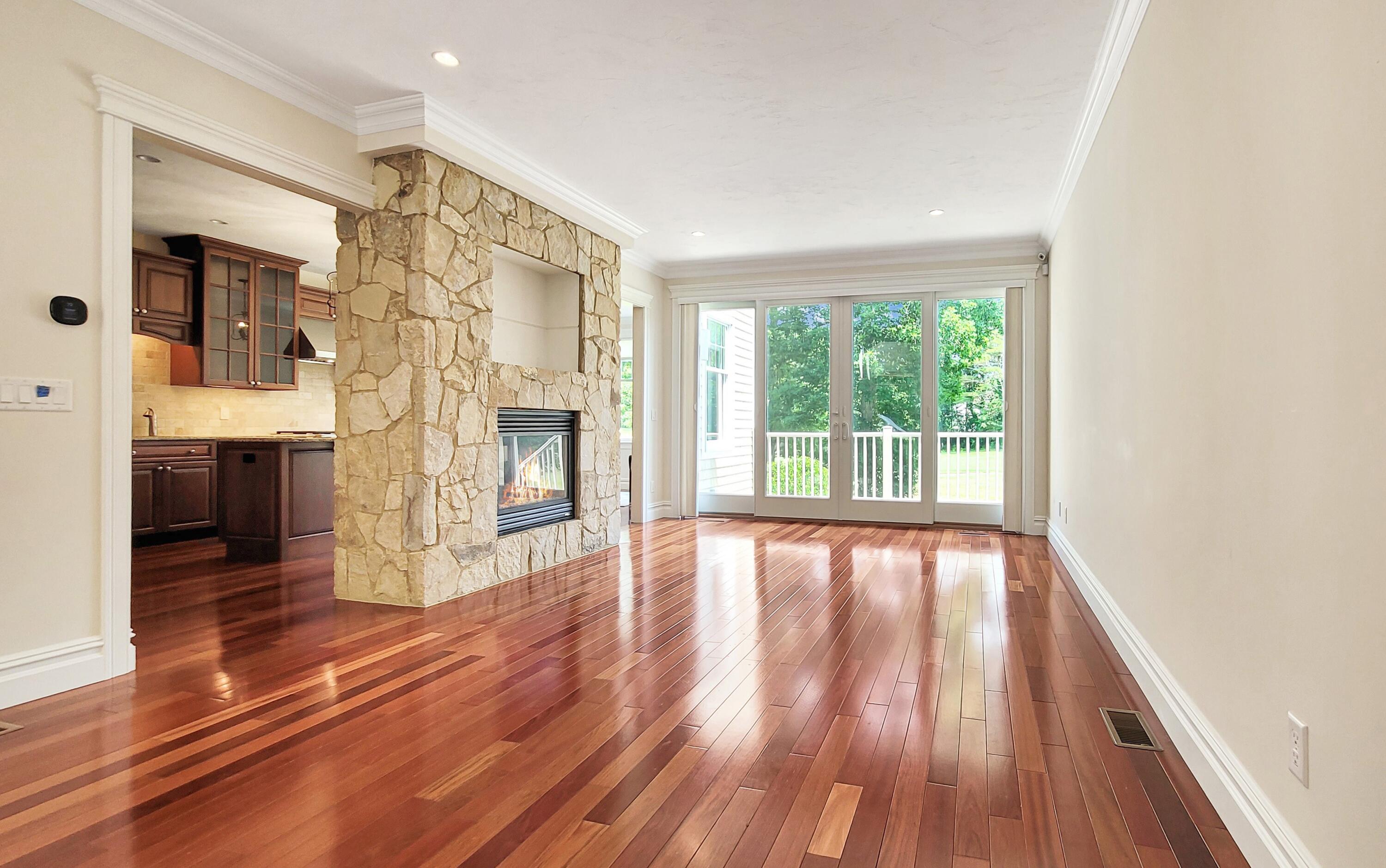 4 Quinns Way Mashpee, MA 02649 - Photo 7 of 28 a view of an empty room with a window and wooden floor