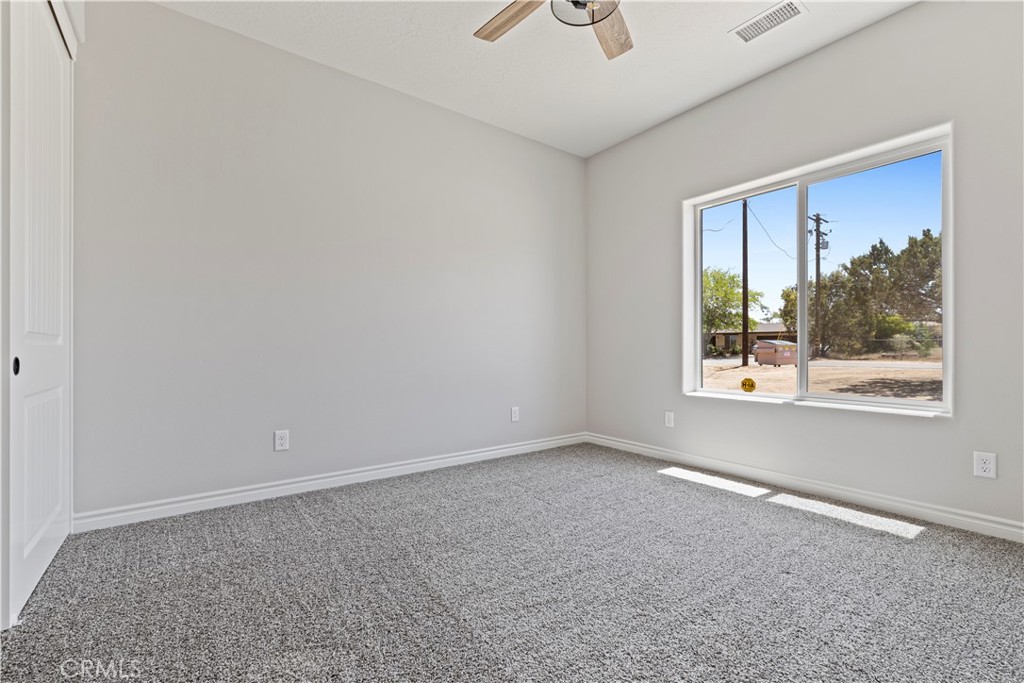 14586 Ash Hesperia, CA 92345 - Photo 20 of 30 an empty room with a window