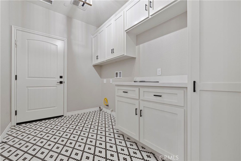 14586 Ash Hesperia, CA 92345 - Photo 22 of 30 a bathroom with a sink and a mirror