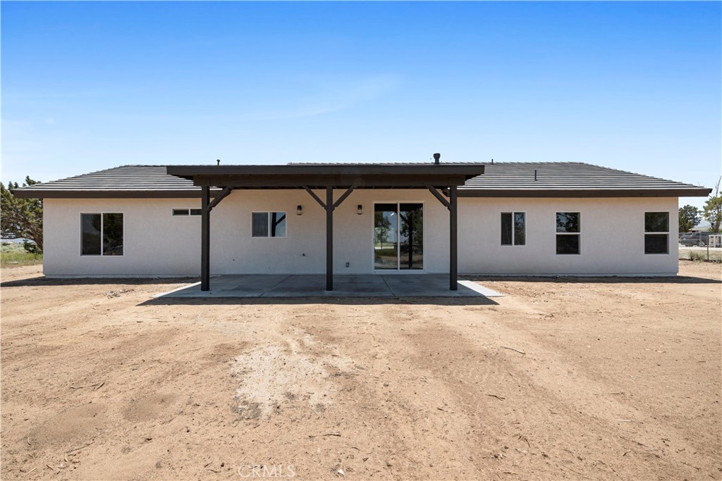 14586 Ash Hesperia, CA 92345 - Photo 28 of 30 a house with yard and a outdoor space