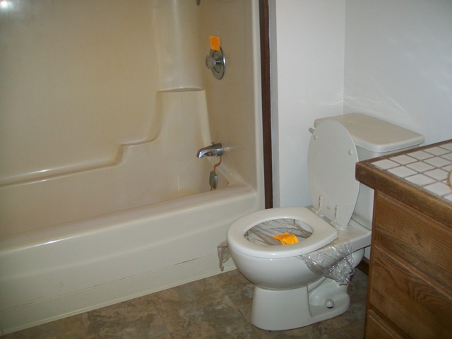 26155 West Lotus Road Antioch, IL 60002 - Photo 13 of 14 a bathroom with a toilet and a shower