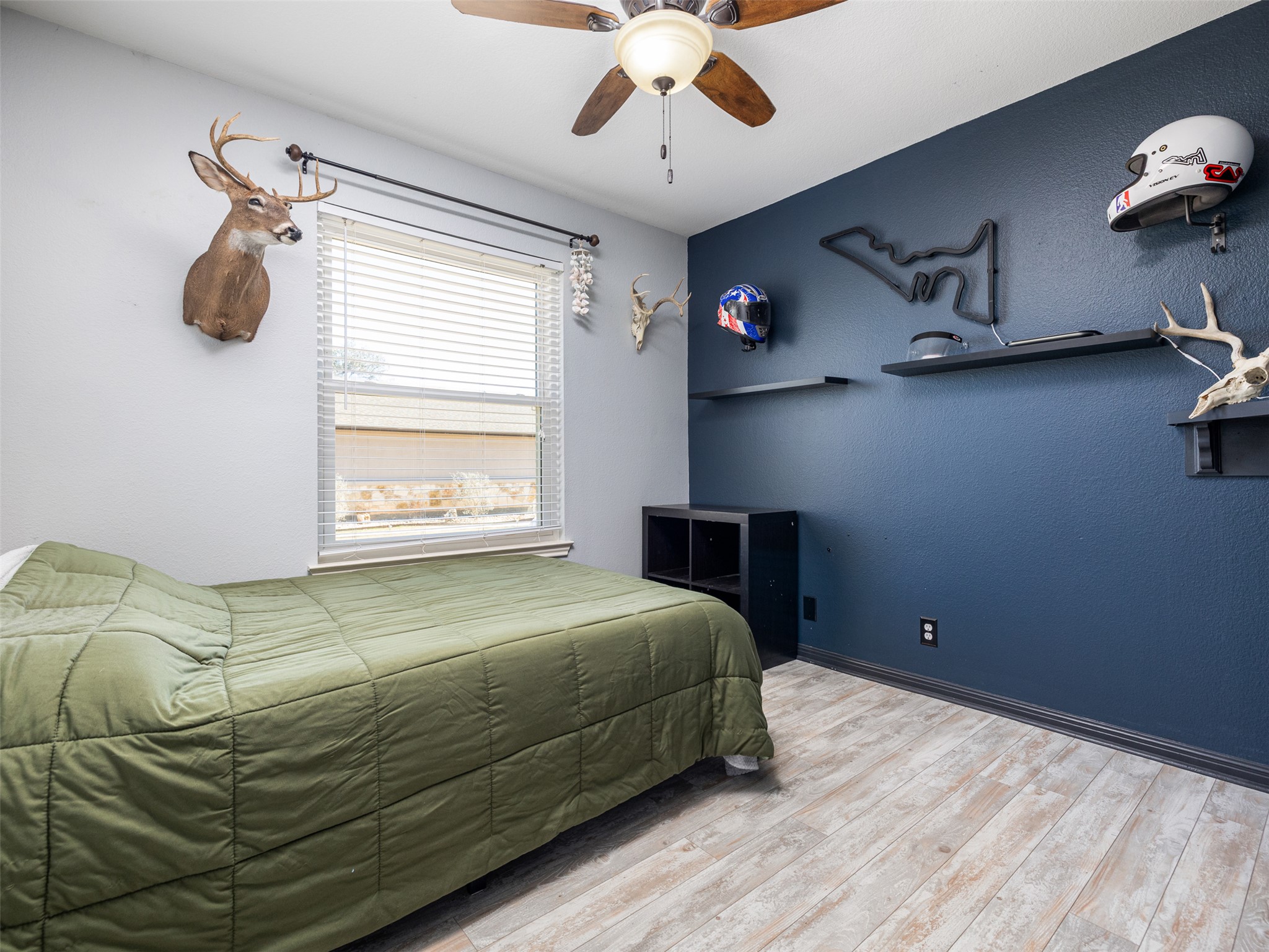 208 South Buffalo Pass Georgetown, TX 78633 - Photo 19 of 28 Bedroom with wood finished floors and a ceiling fan