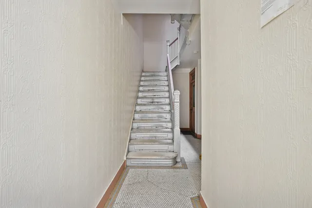 a view of entryway with stairs