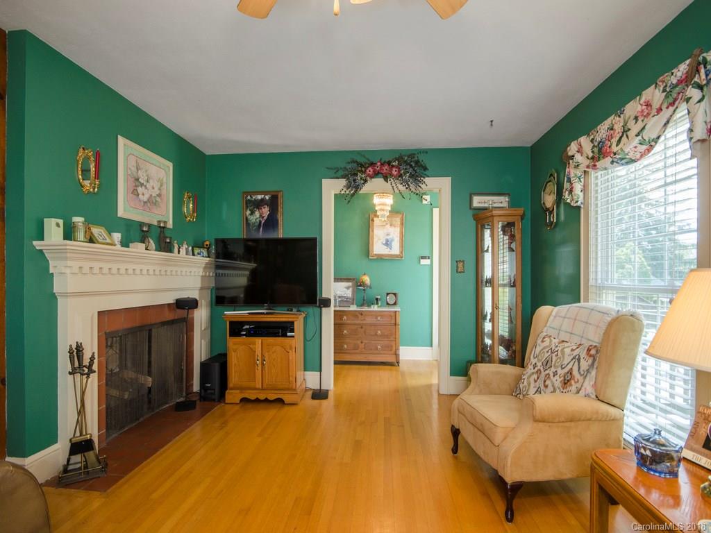 9 Star Ridge Road Canton, NC 28716 - Photo 3 of 13 a living room with furniture and a fireplace