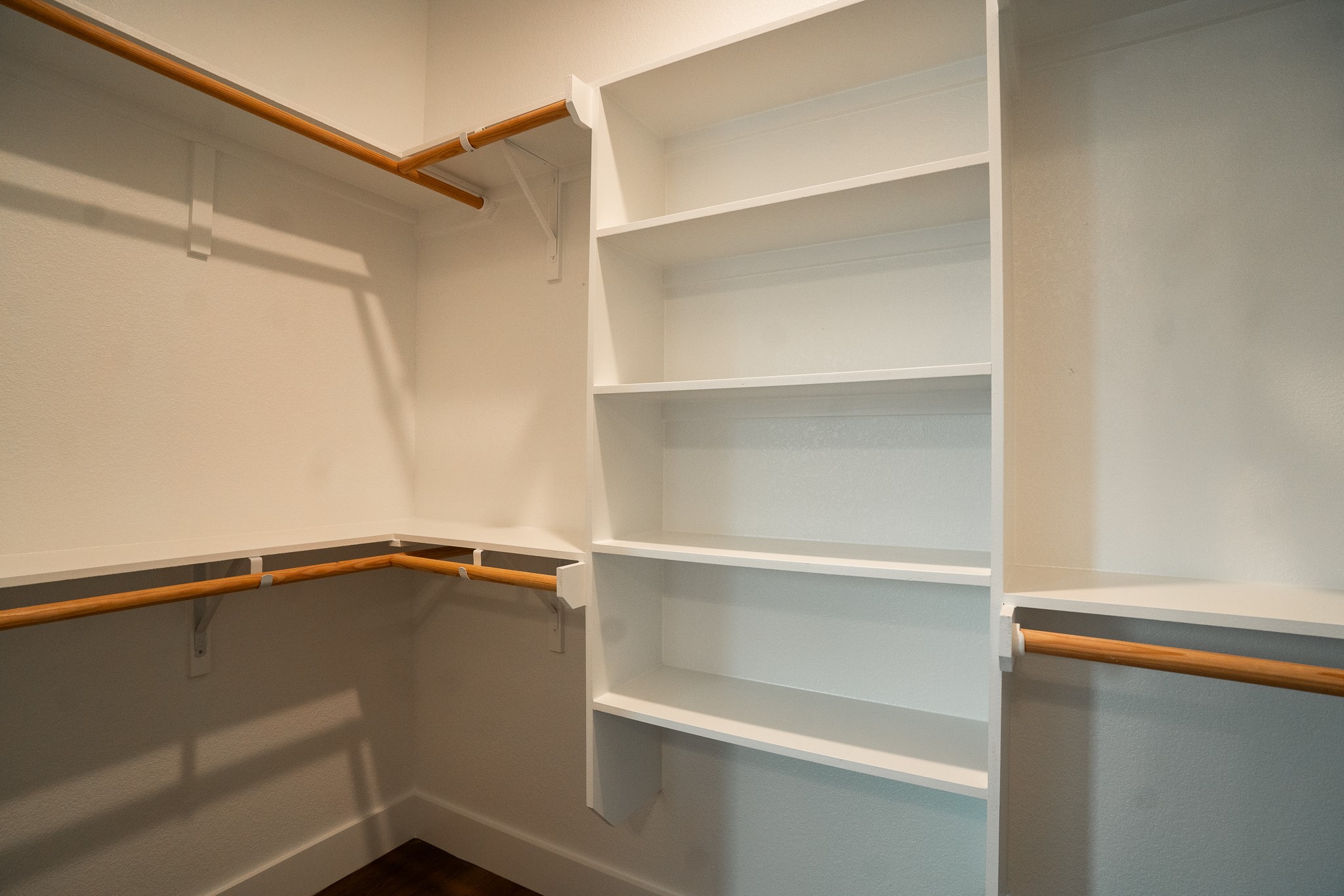 305 String Prairie Way Smithville, TX 78957 - Photo 23 of 26 a view of walk in closet with empty racks