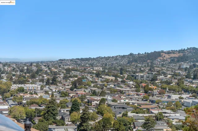 a kitchen with stainless steel appliances granite countertop white cabinets a sink and dishwasher