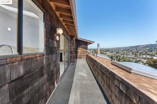 a kitchen with a sink and a stove top oven