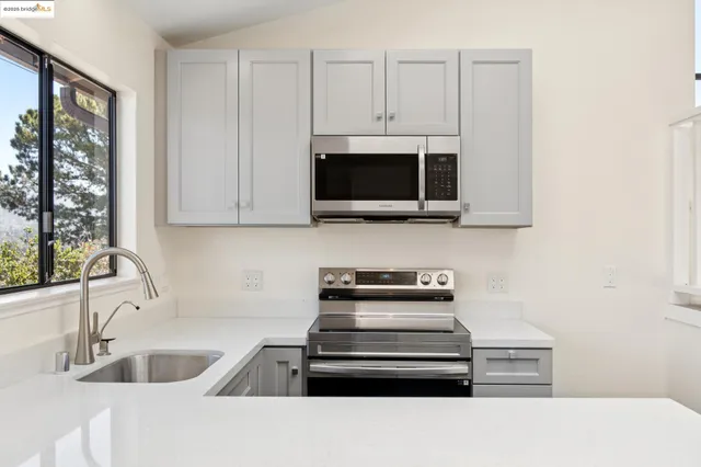 a bathroom with a toilet sink and a shower