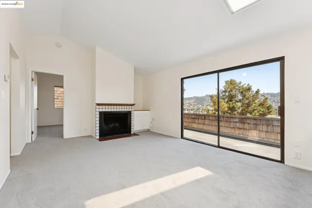 an aerial view of residential house with green space