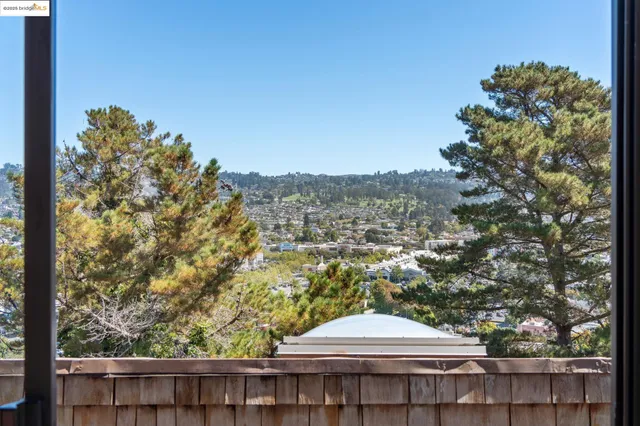a kitchen with stainless steel appliances granite countertop a sink a stove and microwave