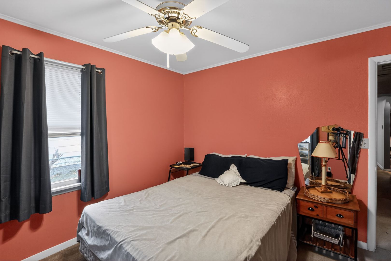 1006 Hester Avenue Centralia, IL 62801 - Photo 11 of 11 a bedroom with a bed and a chandelier
